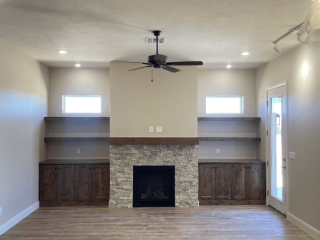 Living Room Fireplace with Built-Ins Living room featuring fireplace and built ins