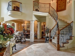 Full Custom Curved Iron and Wood Stairs