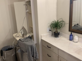 Ironing board built into master bathroom